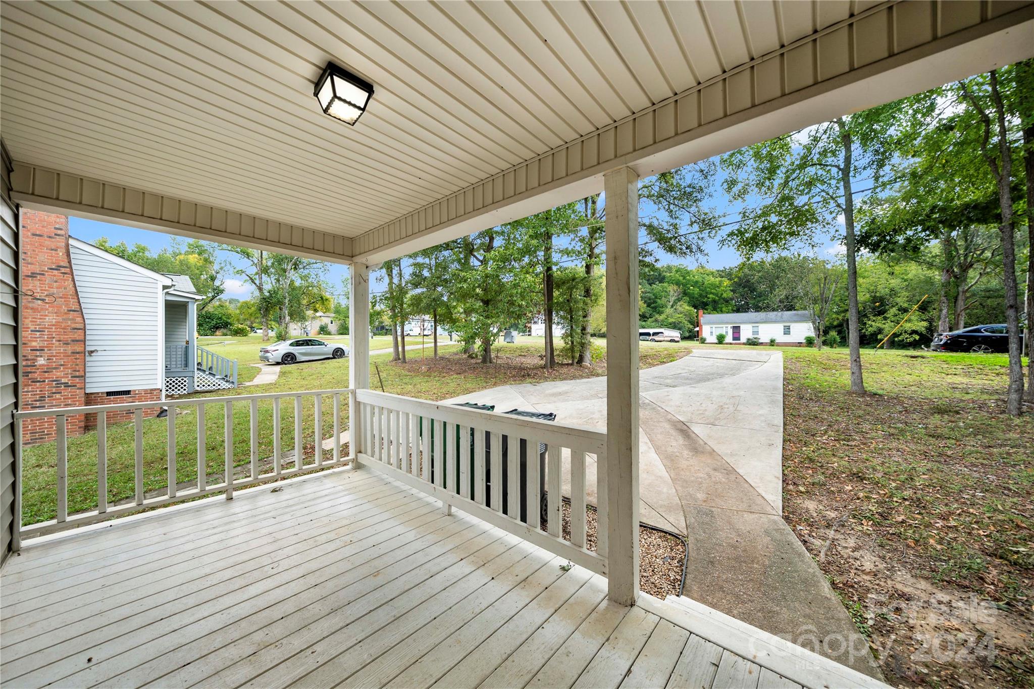 8101 Plott Road Charlotte, NC 28215 - Photo 6 of 34 a view of a patio with wooden floor