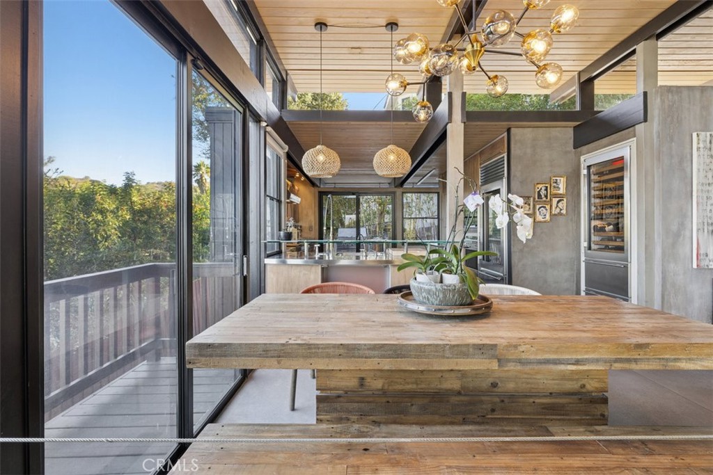 21090 Rios Street Woodland Hills, CA 91364 - Photo 16 of 61 a view of a house with porch and wooden floor