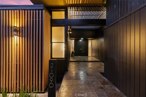 a room with water heater and wooden floor