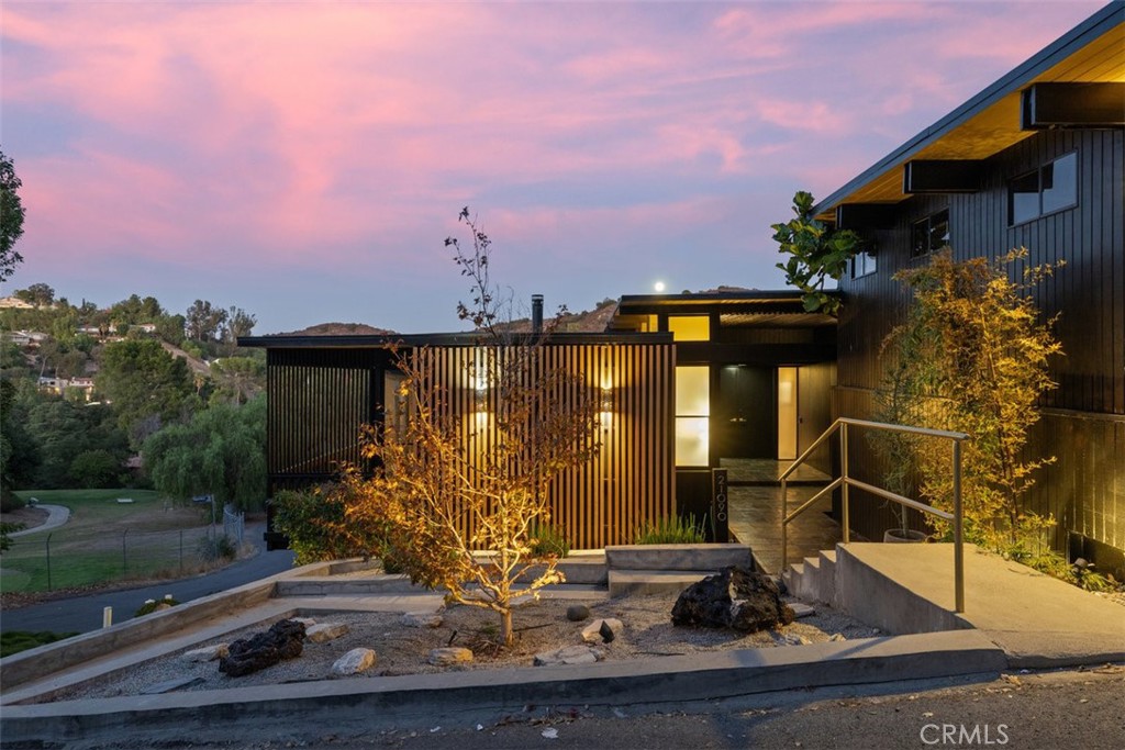 21090 Rios Street Woodland Hills, CA 91364 - Photo 54 of 61 a view of a house with a street