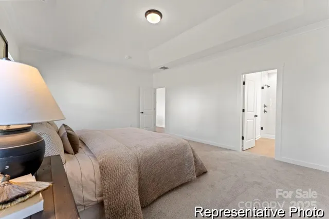 a bathroom with a double vanity sink toilet and shower