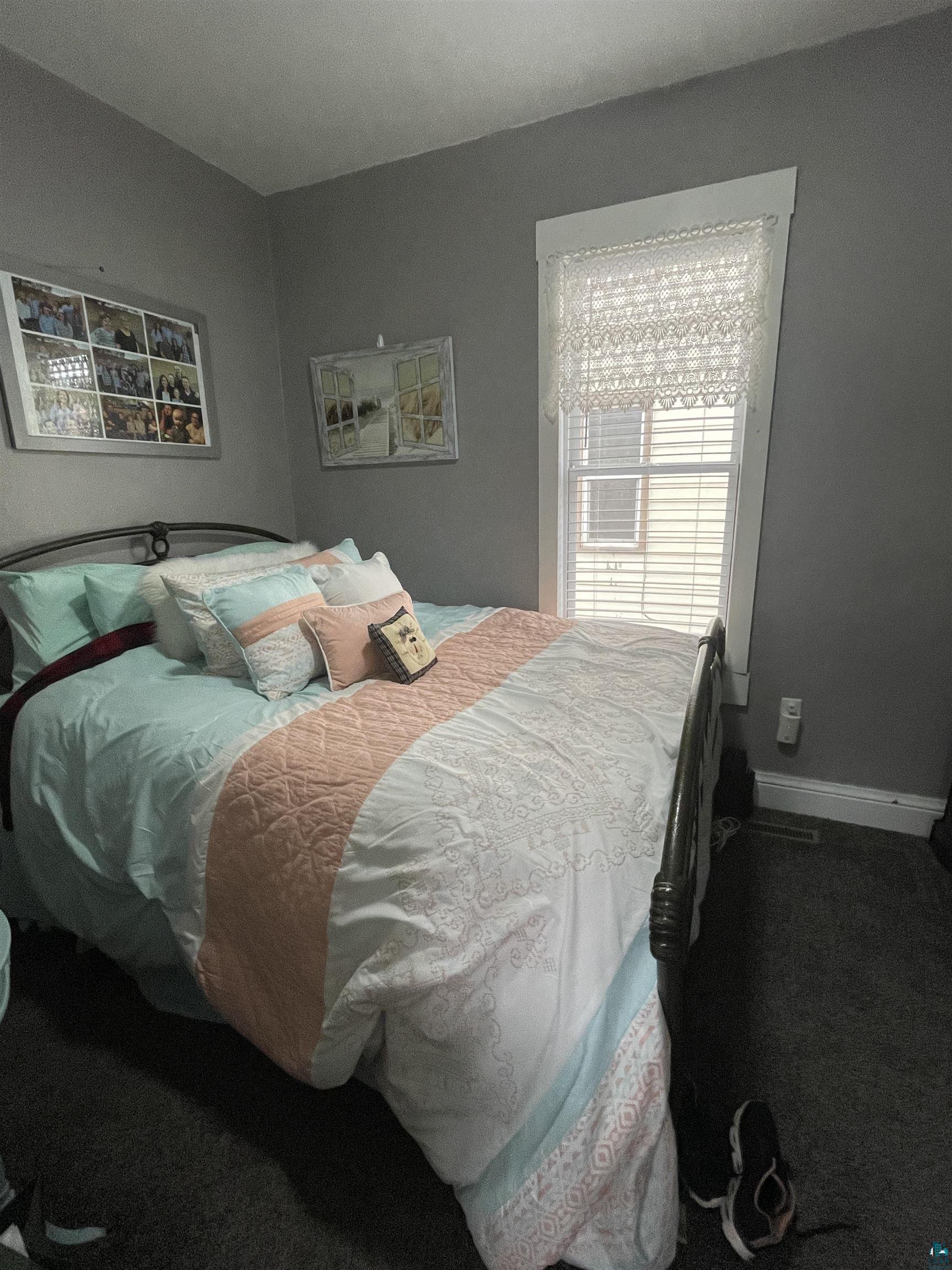 203 3rd Street South Virginia, MN 55792 - Photo 11 of 22 Carpeted bedroom with baseboards