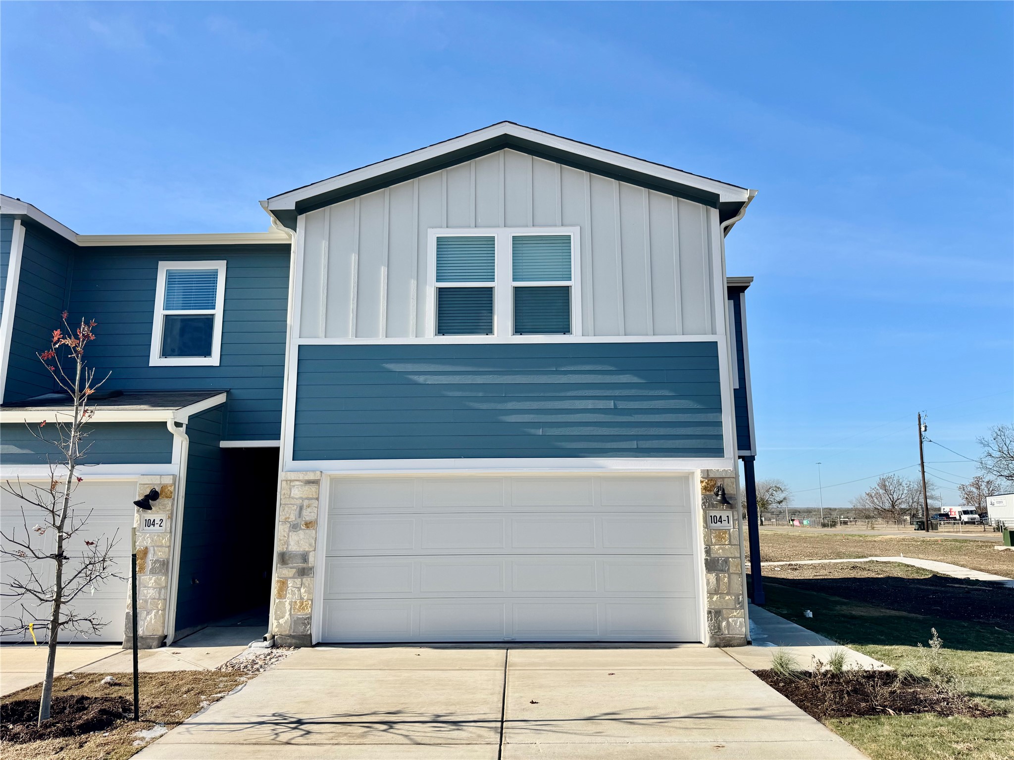 104 Calcite Road, Unit 1 Kyle, TX 78640 - Photo 1 of 7 a front view of a house with a balcony