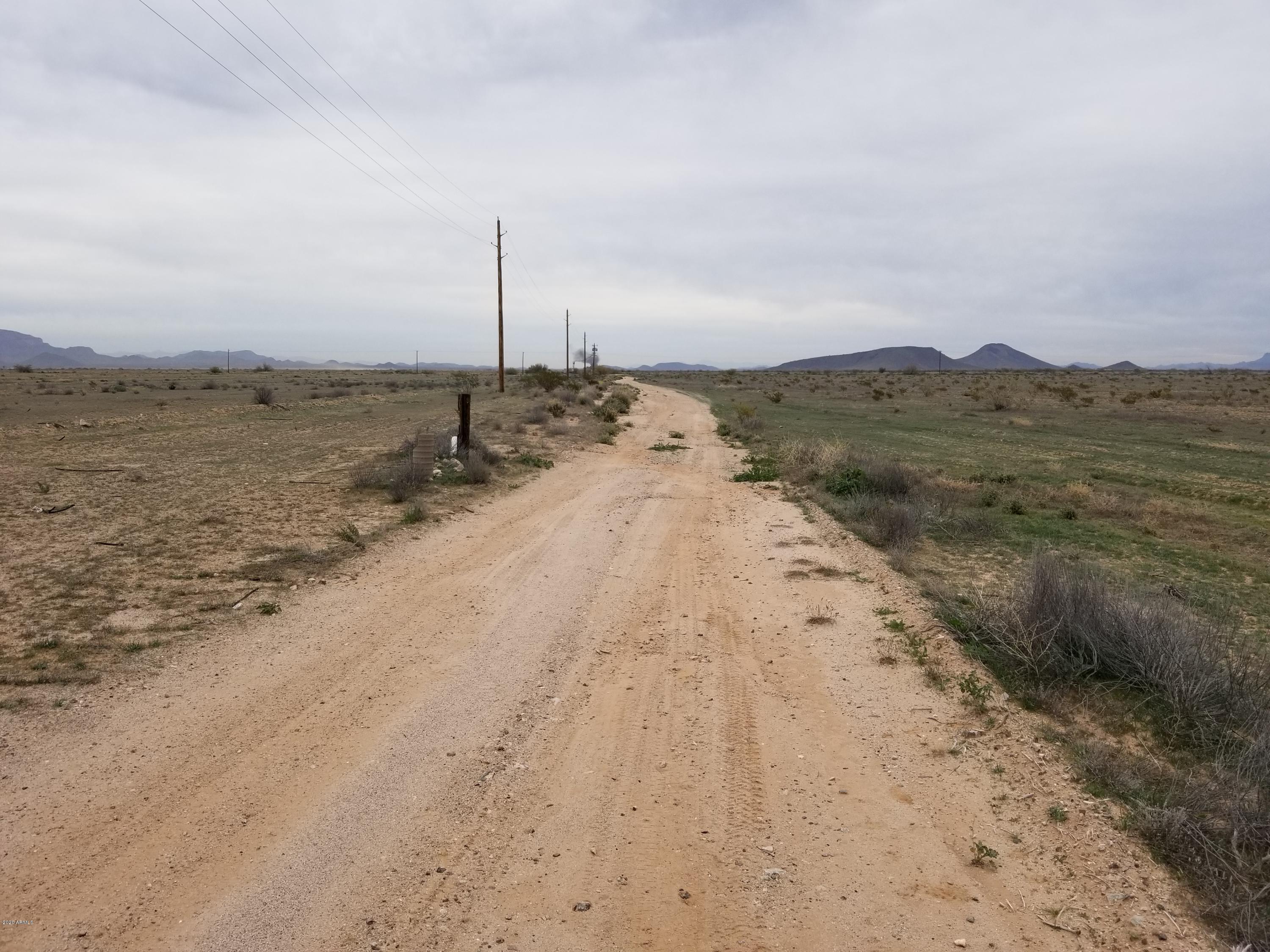 0 West Elliot Road Tonopah, AZ 85354 - Photo 19 of 25 a view of a beach with a mountain