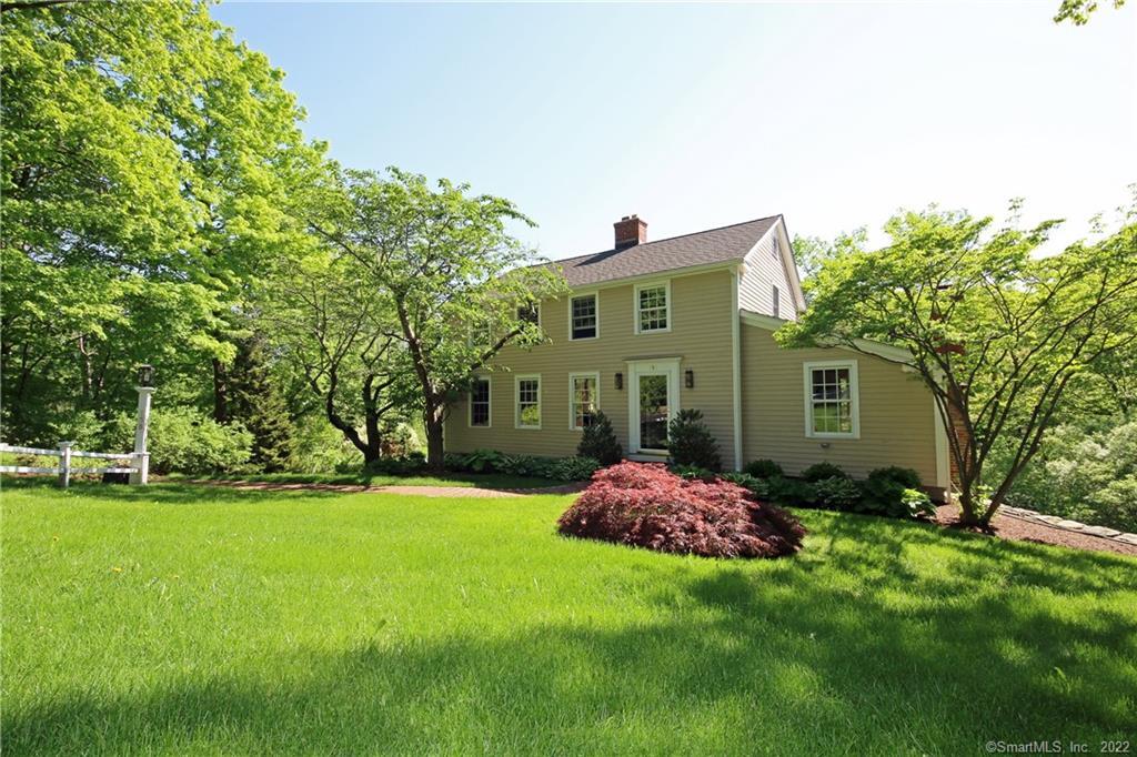 158 Main Street Ridgefield, CT 06877 - Photo 1 of 1 a view of a house with a yard