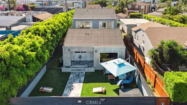 an aerial view of a house with a garden