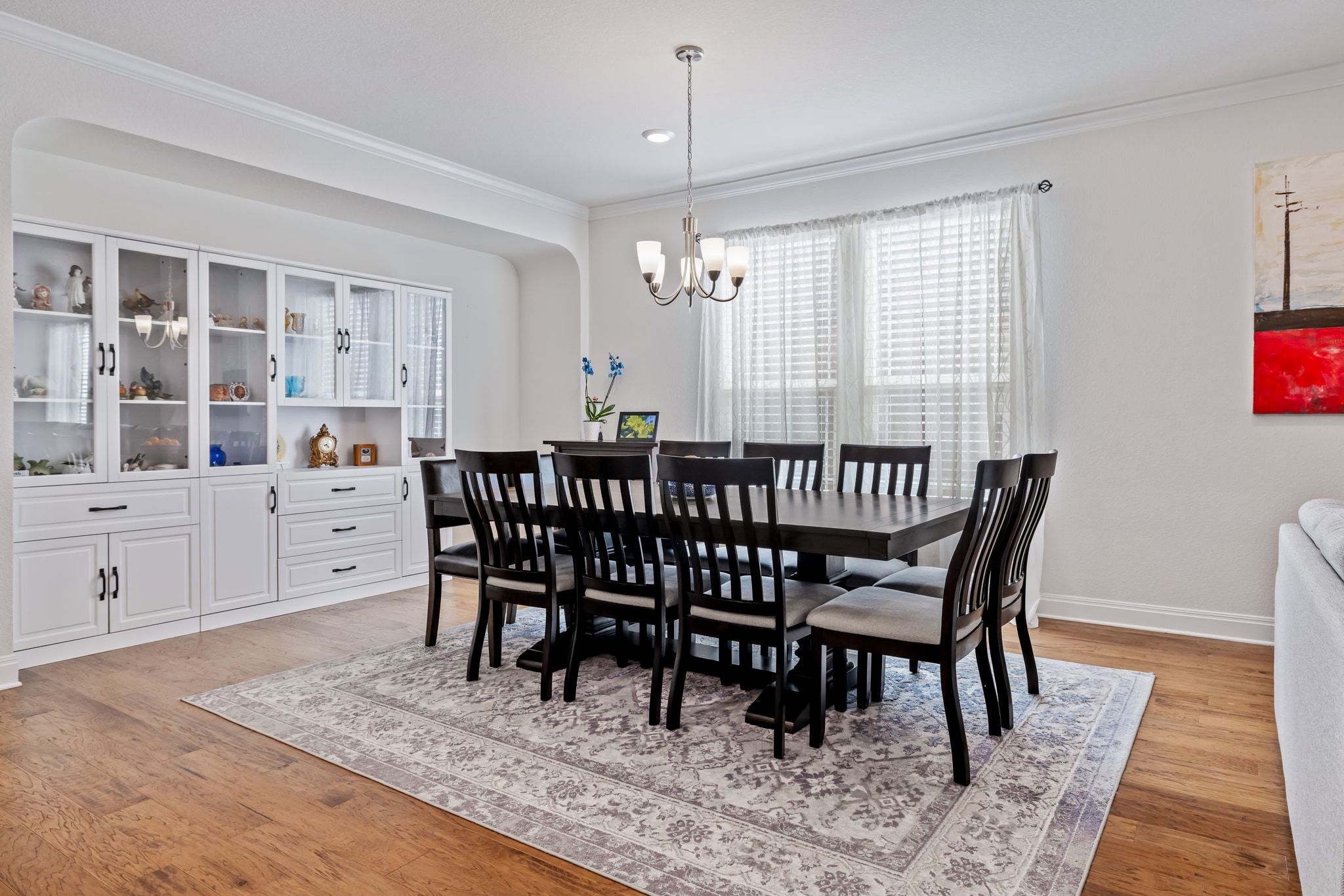 1022 Toltec Trail Georgetown, TX 78626 - Photo 16 of 37 Dining room featuring crown molding, a chandelier, light wood-style flooring, and recessed lighting