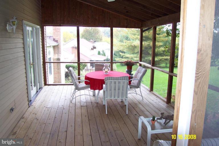 1015 Valewood Road Towson, MD 21286 - Photo 6 of 6 a dining room with furniture and wooden floor