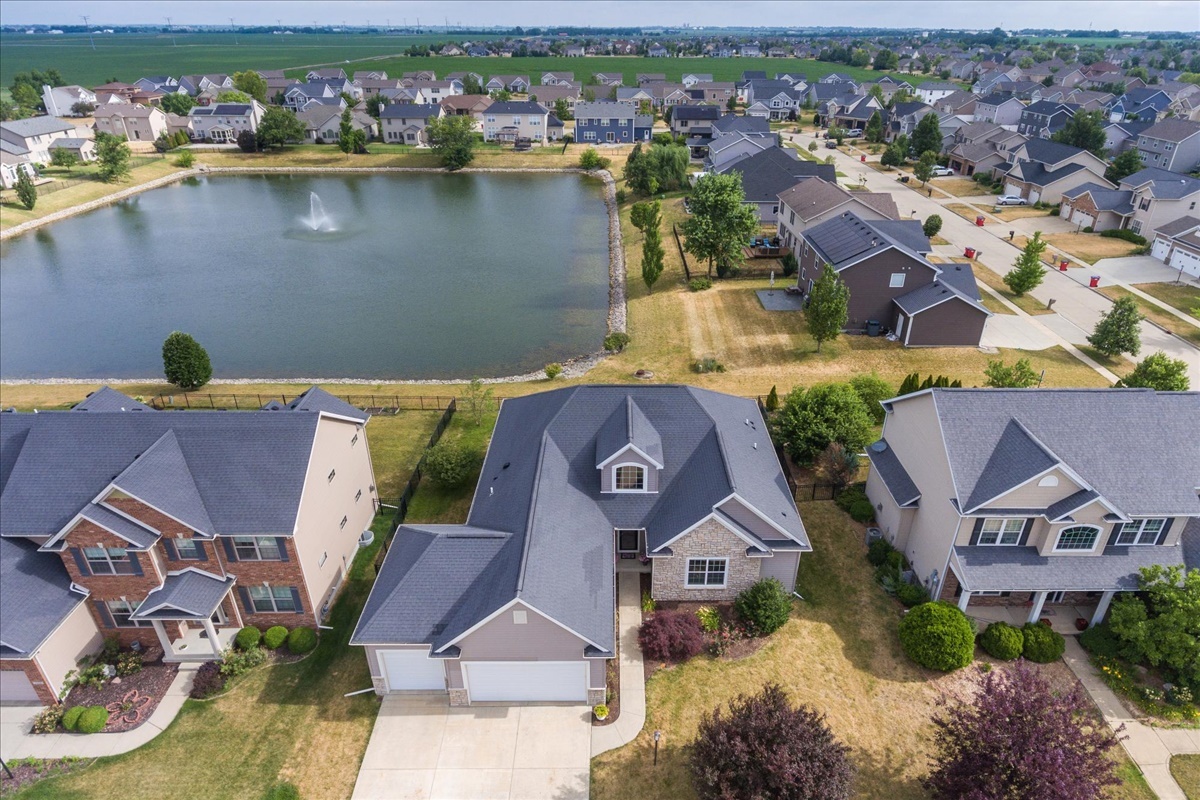 5104 Stonebridge Drive Champaign, IL 61822 - Photo 2 of 69 an aerial view of residential houses with outdoor space and parking