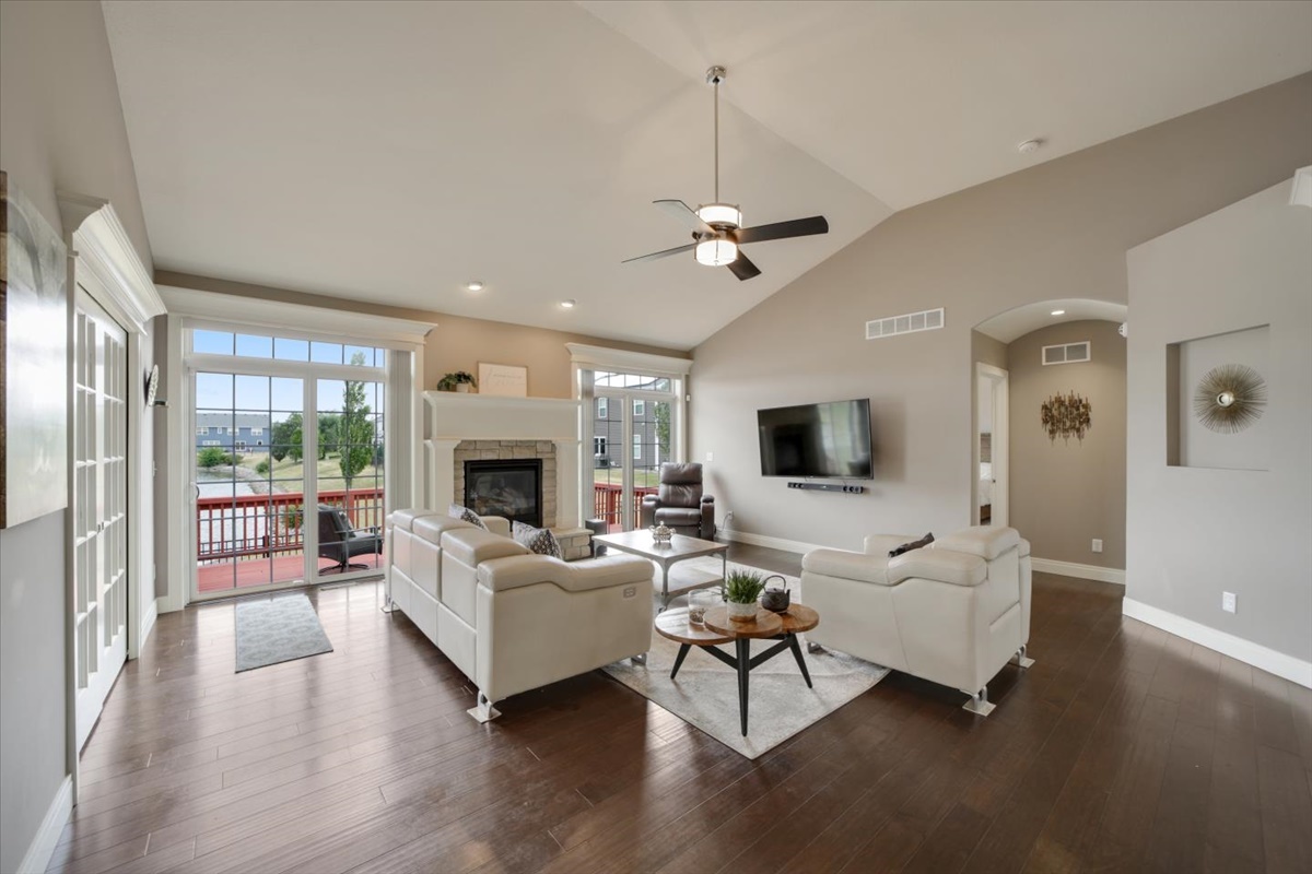 5104 Stonebridge Drive Champaign, IL 61822 - Photo 21 of 69 a living room with furniture fireplace and a flat screen tv