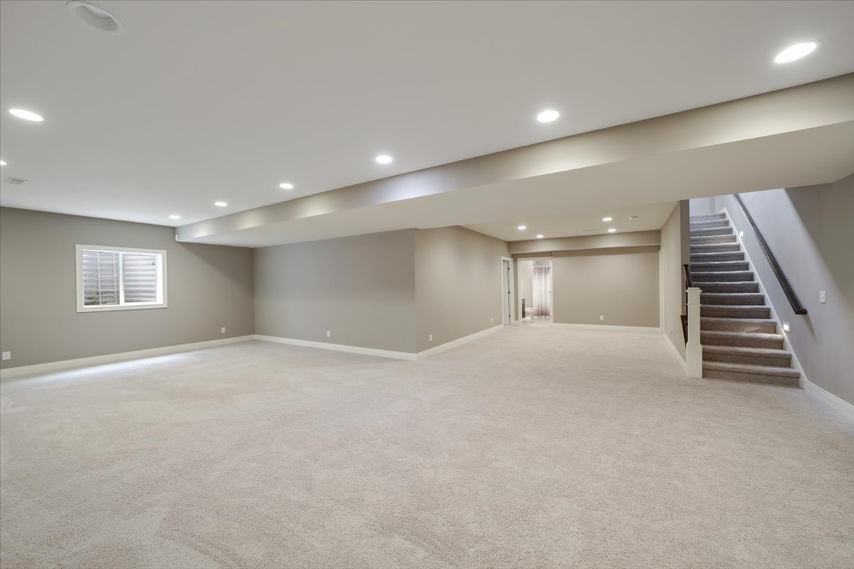 5104 Stonebridge Drive Champaign, IL 61822 - Photo 34 of 69 a view of an empty room with stairs and ventilation