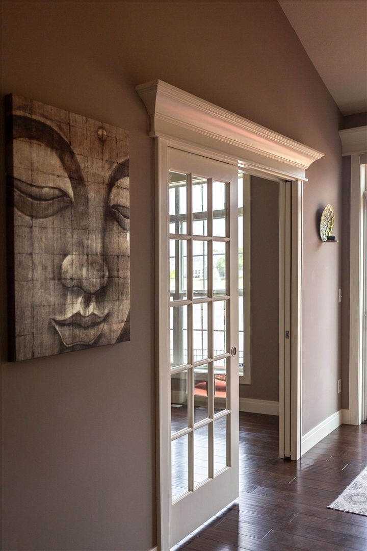 5104 Stonebridge Drive Champaign, IL 61822 - Photo 48 of 69 a view of a room with wooden floor and windows