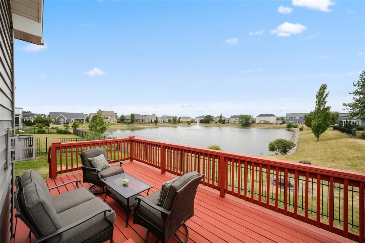 5104 Stonebridge Drive Champaign, IL 61822 - Photo 58 of 69 a view of a balcony with wooden floor and outdoor seating