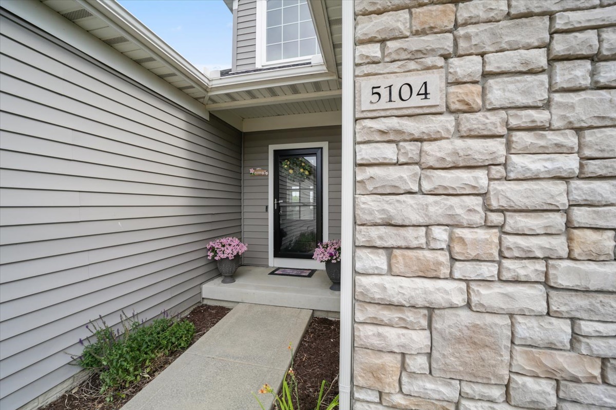 5104 Stonebridge Drive Champaign, IL 61822 - Photo 7 of 69 a view of a entryway door front of house