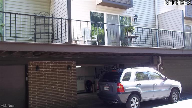 6466 State Road, Unit M4 Parma, OH 44134 - Photo 10 of 12 VIEW OF EXTERIOR 2 CAR GARAGE AND REAR BALCONY!