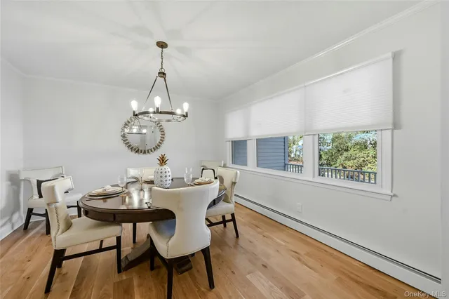 a living room with furniture and a lamp