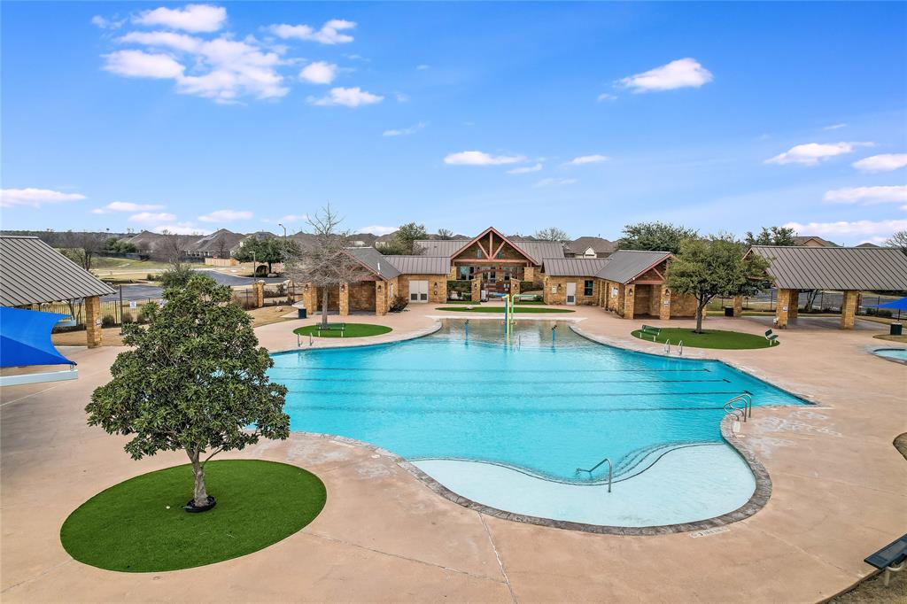 19620 Stanton Drew Pflugerville, TX 78660 - Photo 31 of 33 Community pool featuring a patio and a water play area