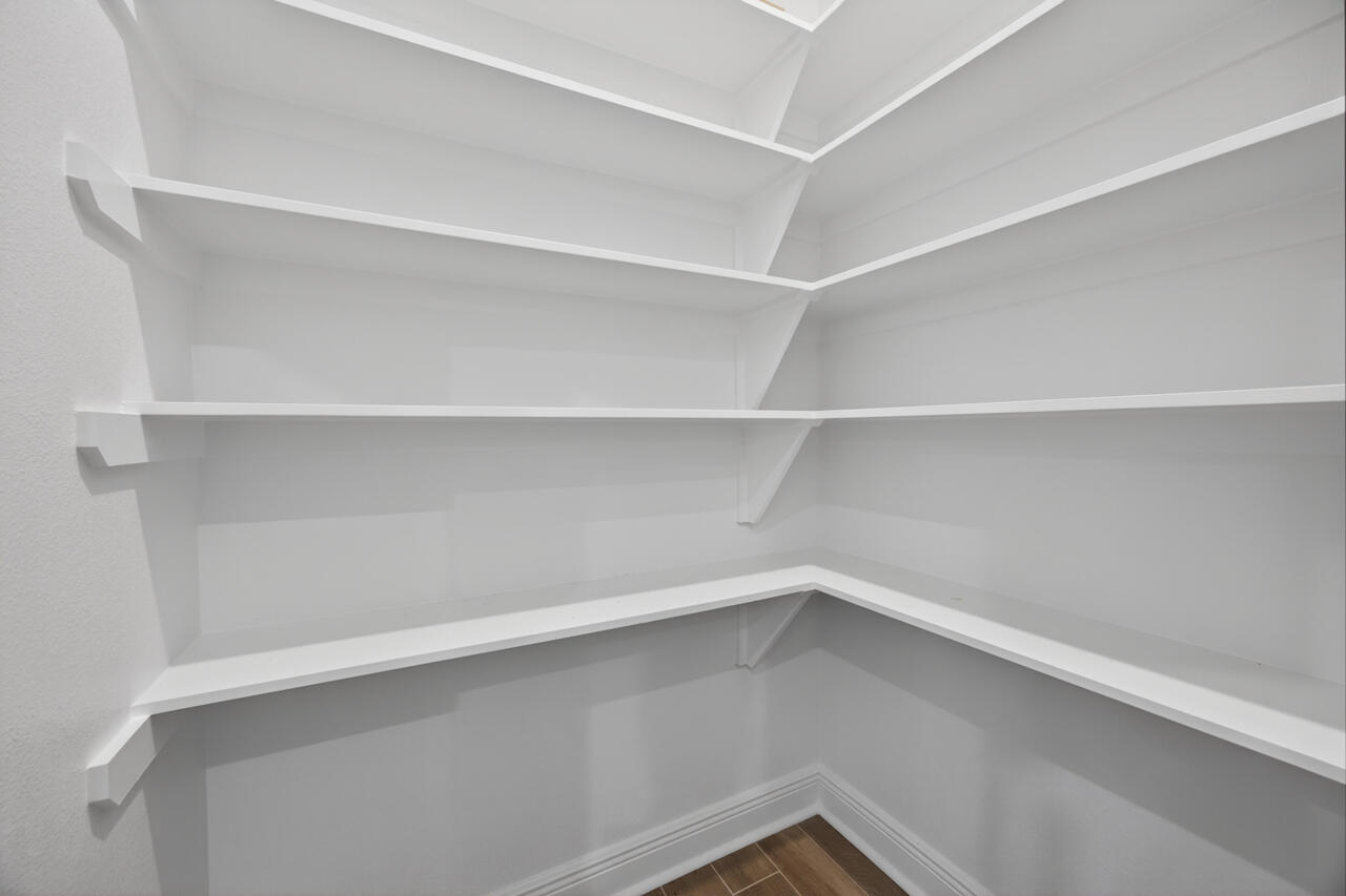 155 Lumen Loop Freeport, FL 32439 - Photo 15 of 46 a view of an empty walk in closet