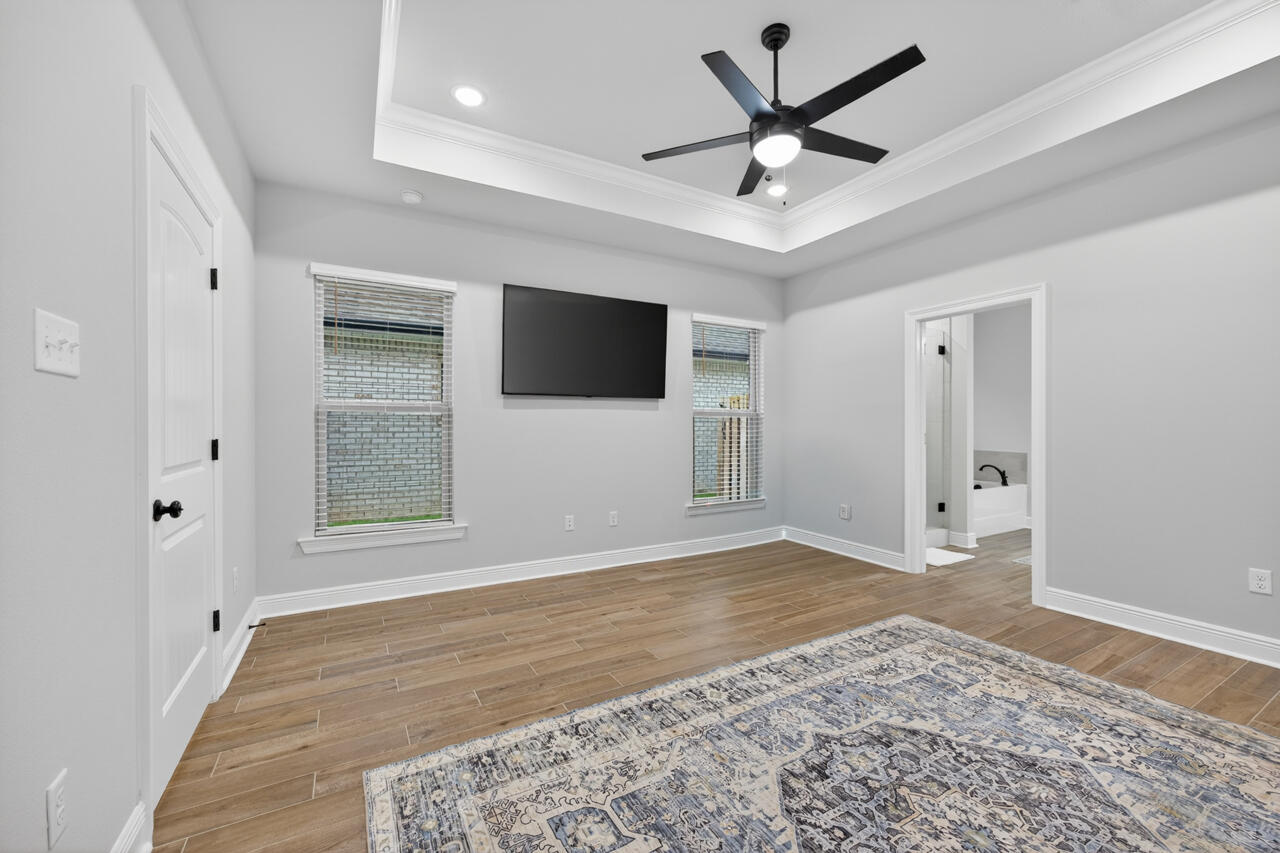 155 Lumen Loop Freeport, FL 32439 - Photo 19 of 48 a view of a livingroom with a flat screen tv