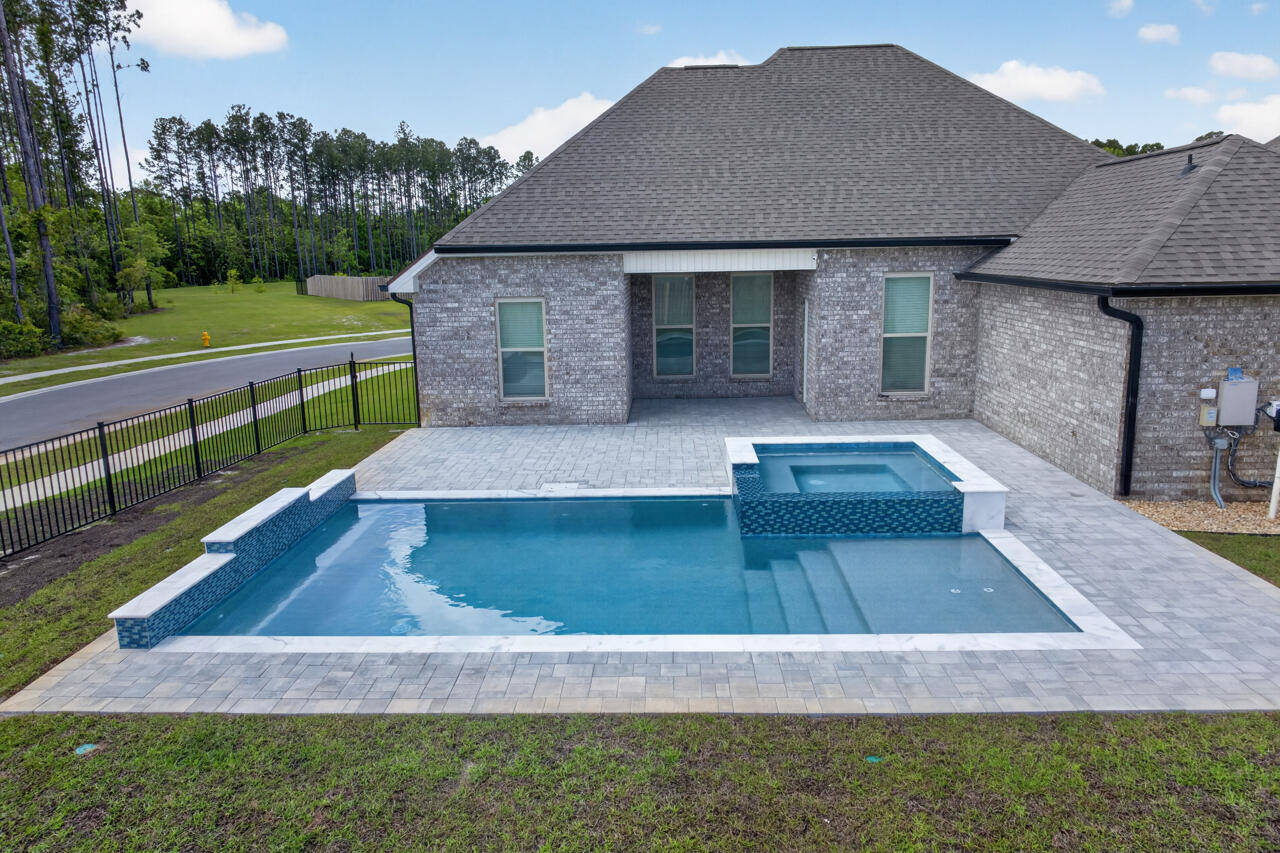 155 Lumen Loop Freeport, FL 32439 - Photo 2 of 46 a view of a house with a yard