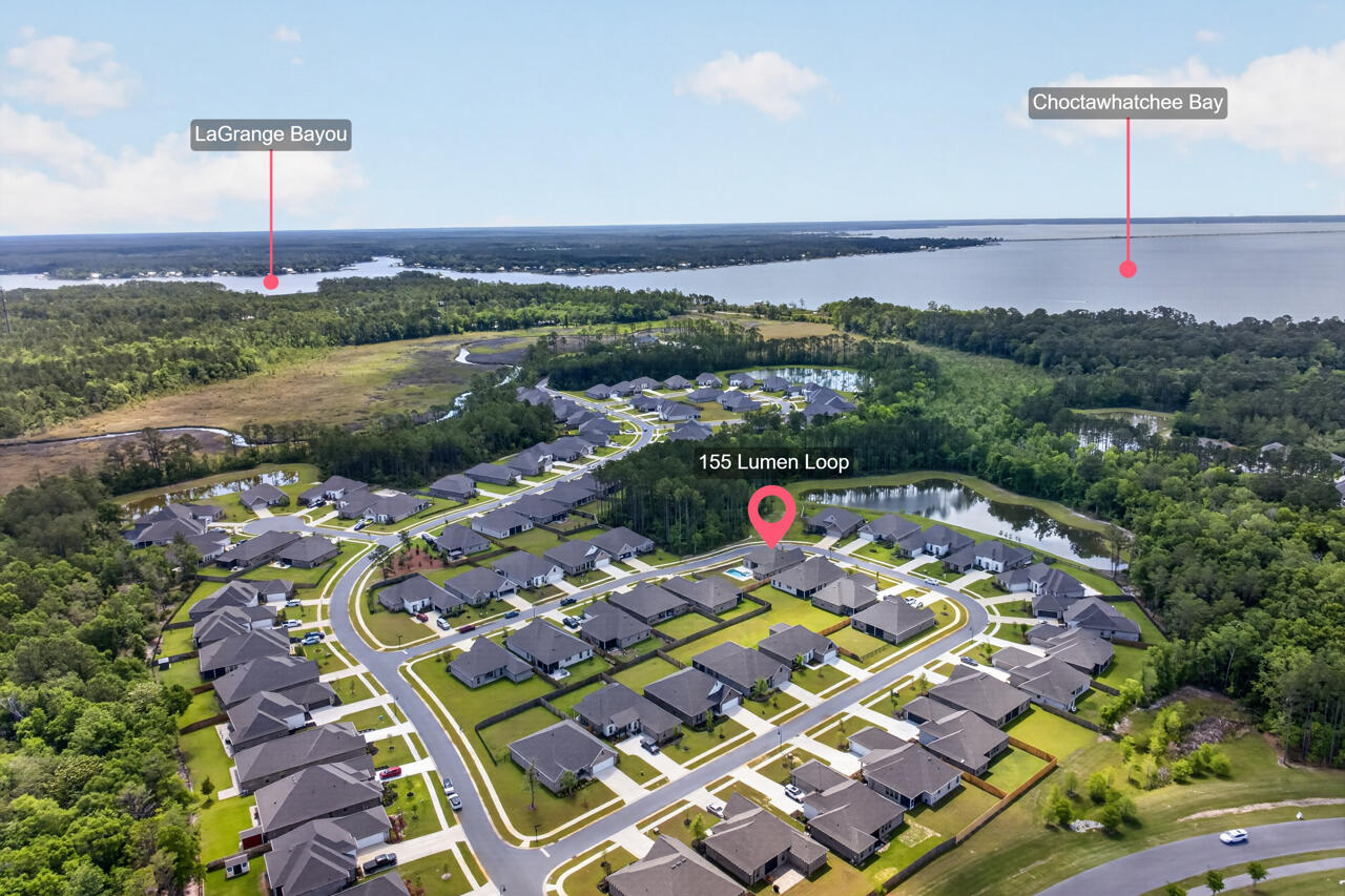 155 Lumen Loop Freeport, FL 32439 - Photo 39 of 46 a picture of city view with balcony