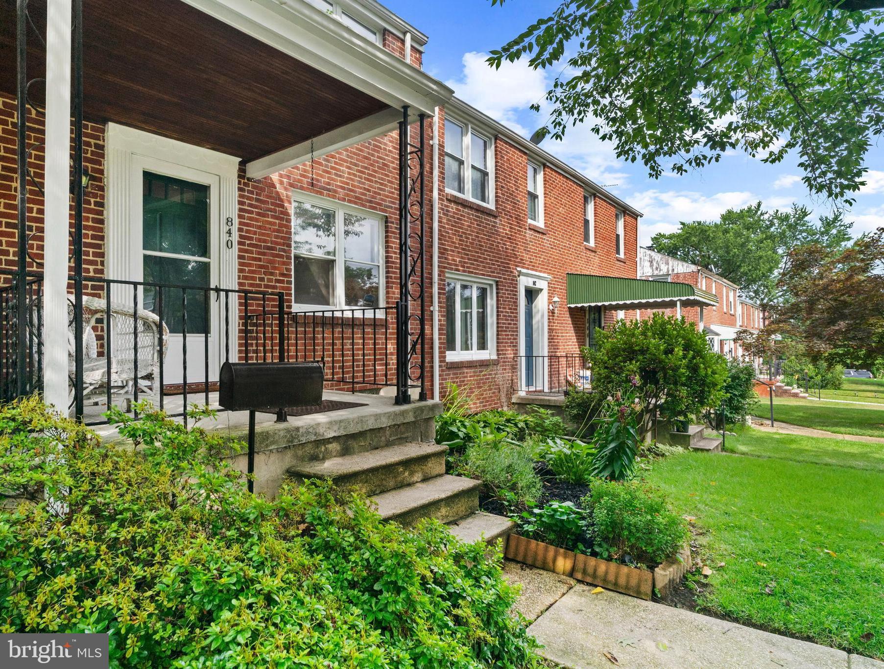 840 Evesham Avenue Baltimore, MD 21212 - Photo 4 of 20 a house view with a garden space