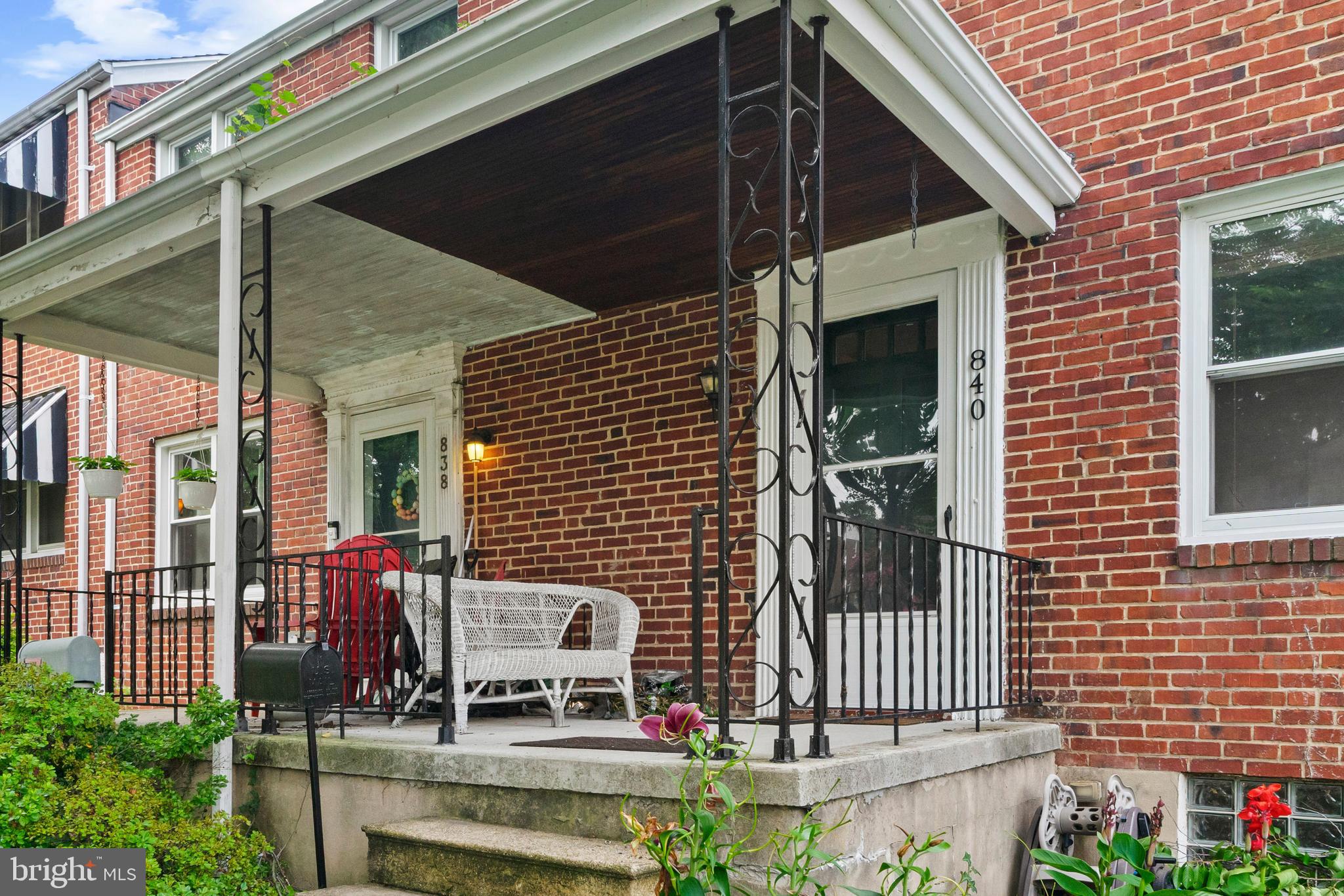 840 Evesham Avenue Baltimore, MD 21212 - Photo 5 of 20 a front view of a house with a garden