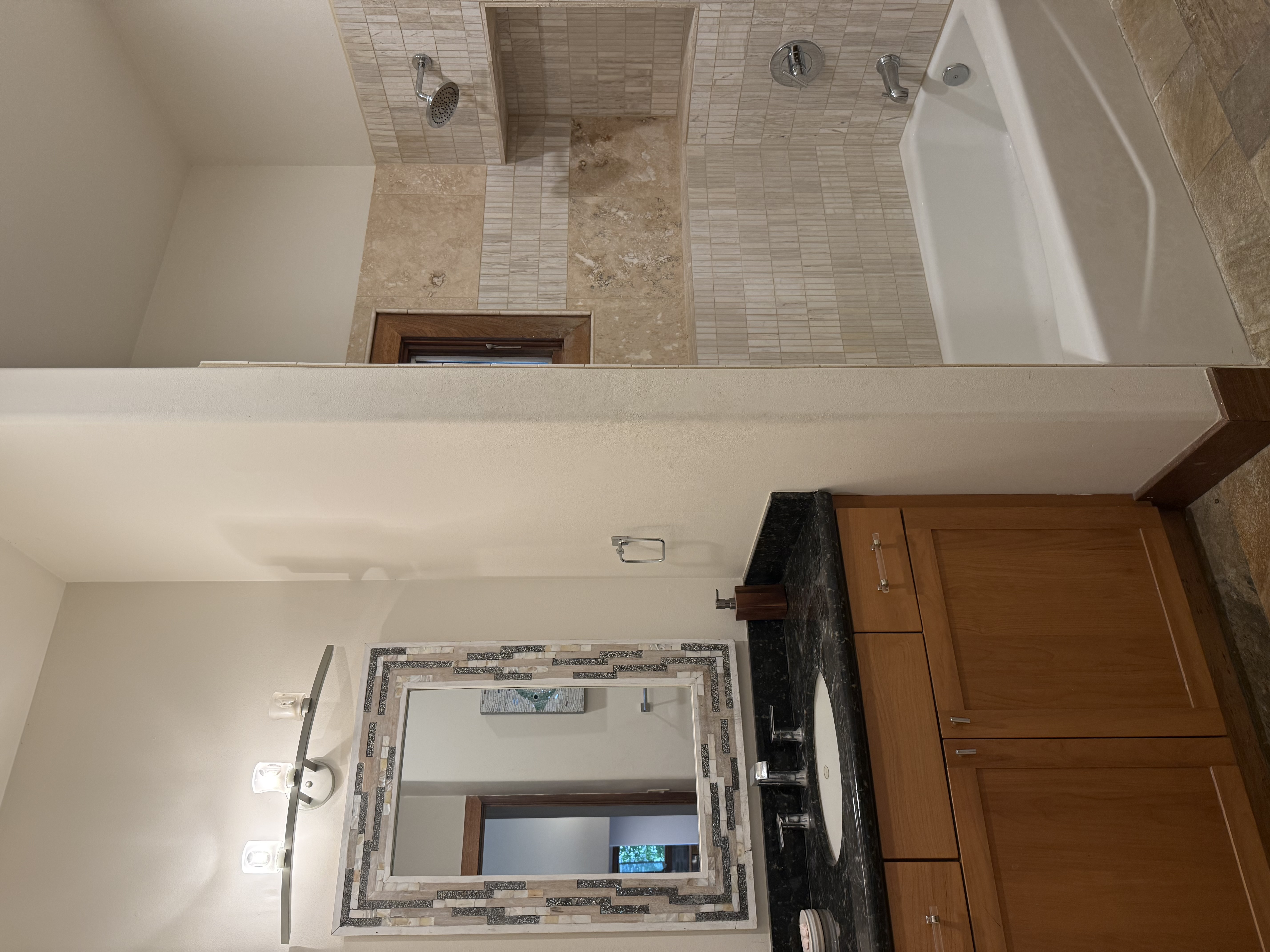 48-5528 Waipio Valley Road Honokaa, HI 96727 - Photo 12 of 18 a bathroom with a granite countertop sink a toilet mirror and bathtub