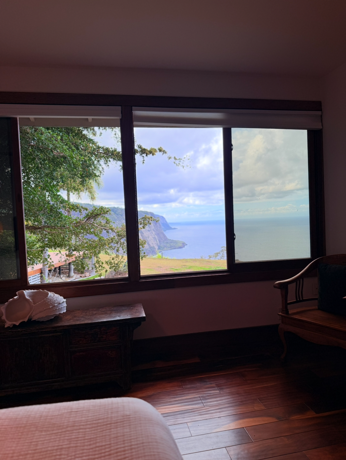 48-5528 Waipio Valley Road Honokaa, HI 96727 - Photo 16 of 18 a view of a balcony with wooden floor and outdoor view