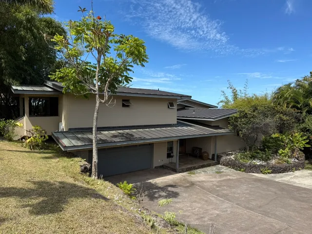 a view of house with outdoor space