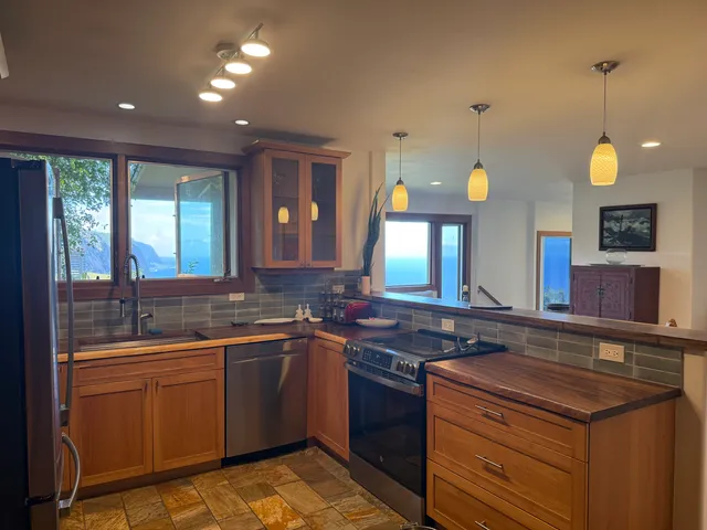 a kitchen with lots of counter space and a sink