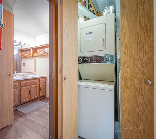 a view of bathroom with a sink dryer and washer