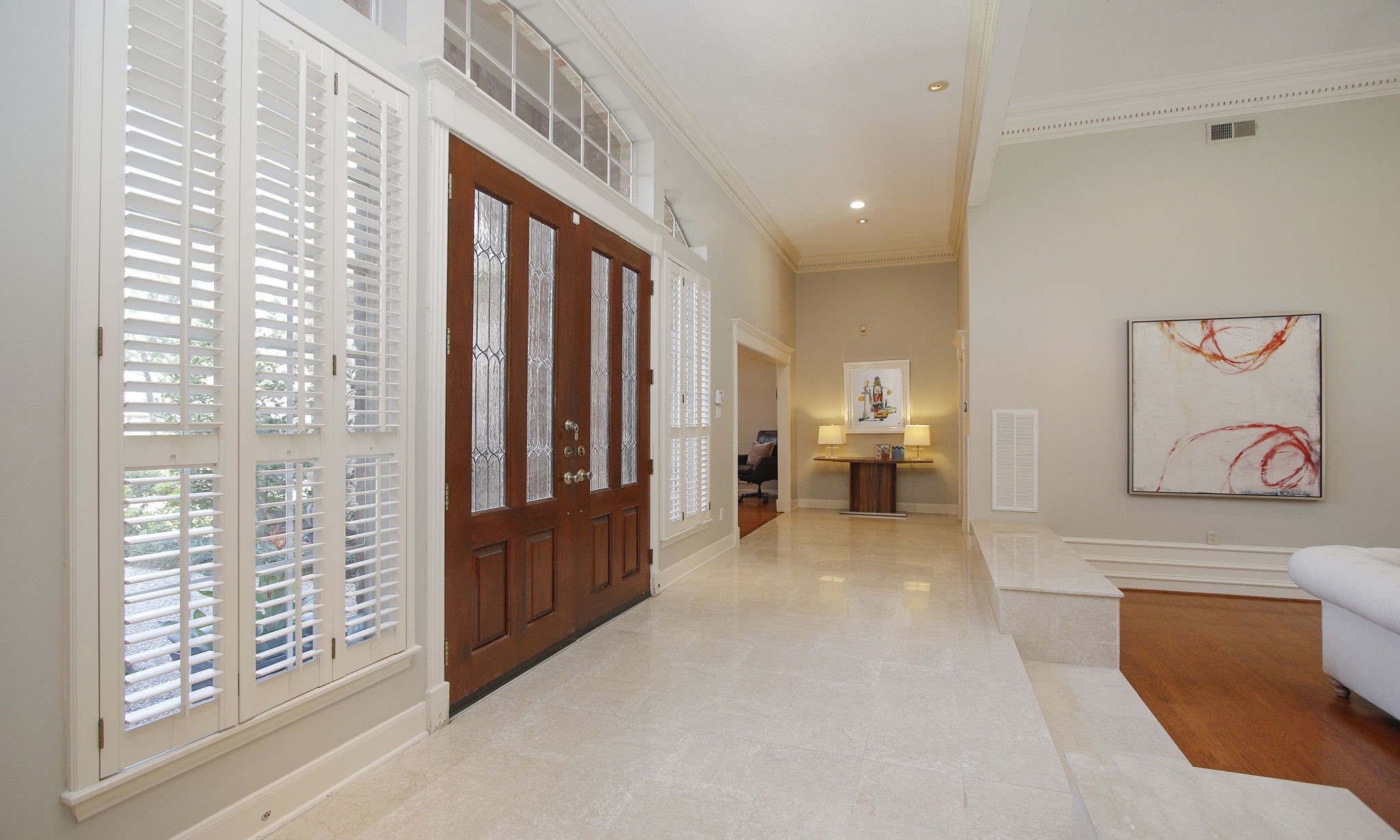 15923 Harwick Drive Spring, TX 77379 - Photo 7 of 50 The foyer of the home features glowing marble floors and connects several rooms of the home.