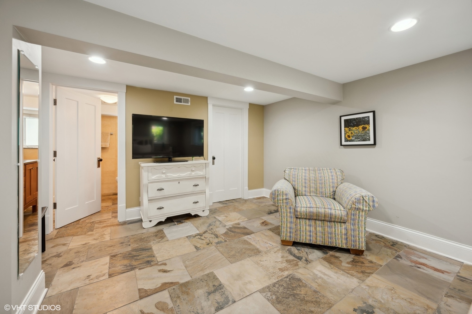 2201 Forestview Road Evanston, IL 60201 - Photo 16 of 27 a living room with furniture and a flat screen tv