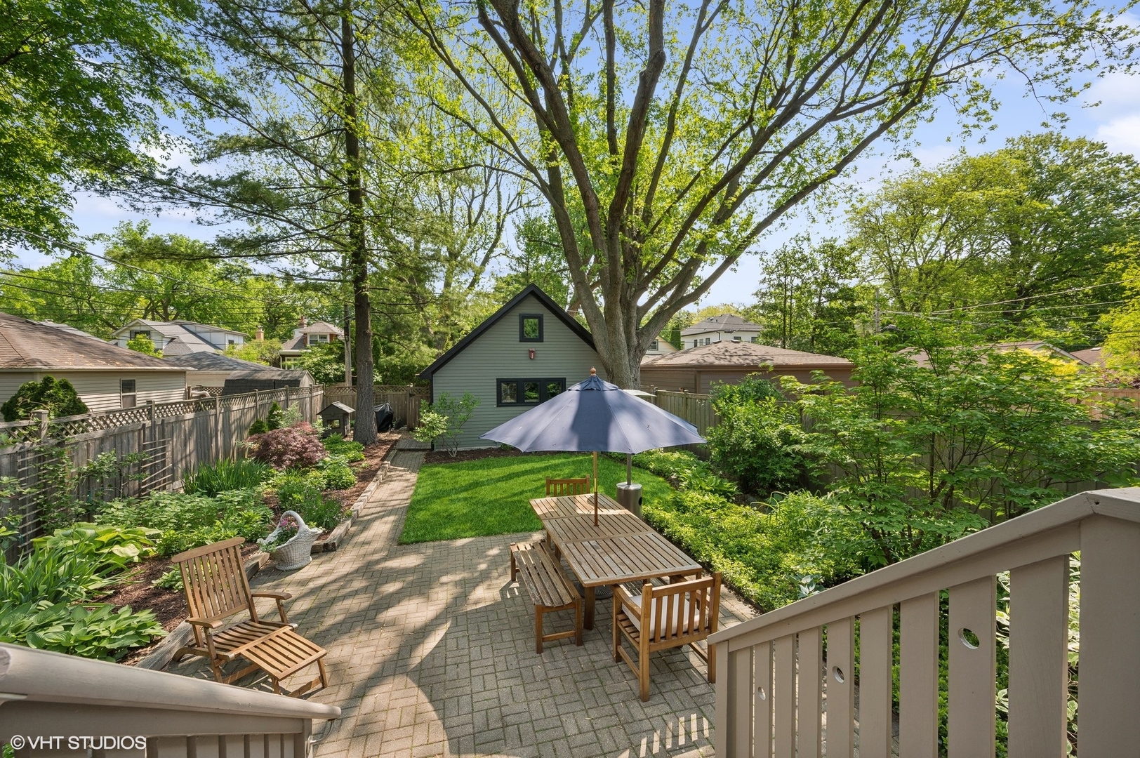 2201 Forestview Road Evanston, IL 60201 - Photo 22 of 27 a view of backyard with deck and garden