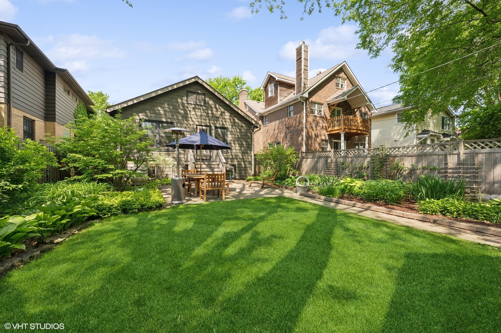 2201 Forestview Road Evanston, IL 60201 - Photo 23 of 27 a front view of a house with yard and green space