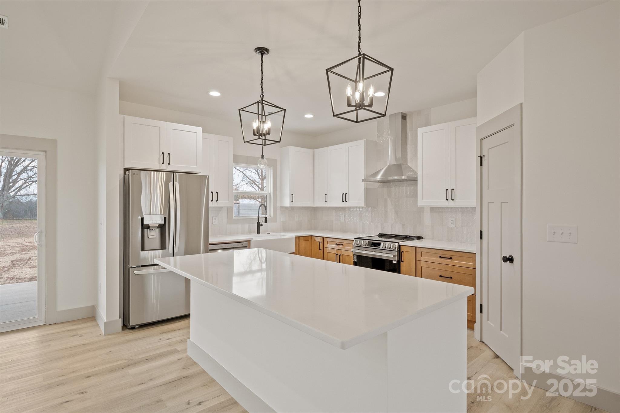 1568 Pleasant Grove Church Road Crouse, NC 28033 - Photo 3 of 48 a large kitchen with stainless steel appliances granite countertop a refrigerator a oven and a sink