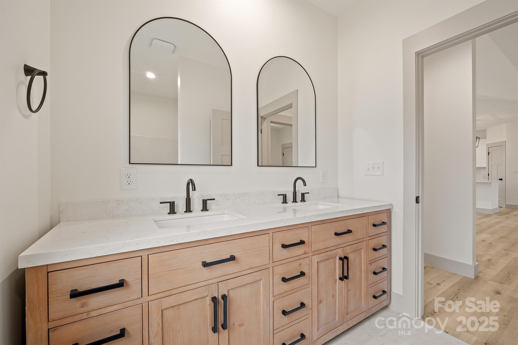 1568 Pleasant Grove Church Road Crouse, NC 28033 - Photo 36 of 48 a bathroom with a double vanity sink and a mirror
