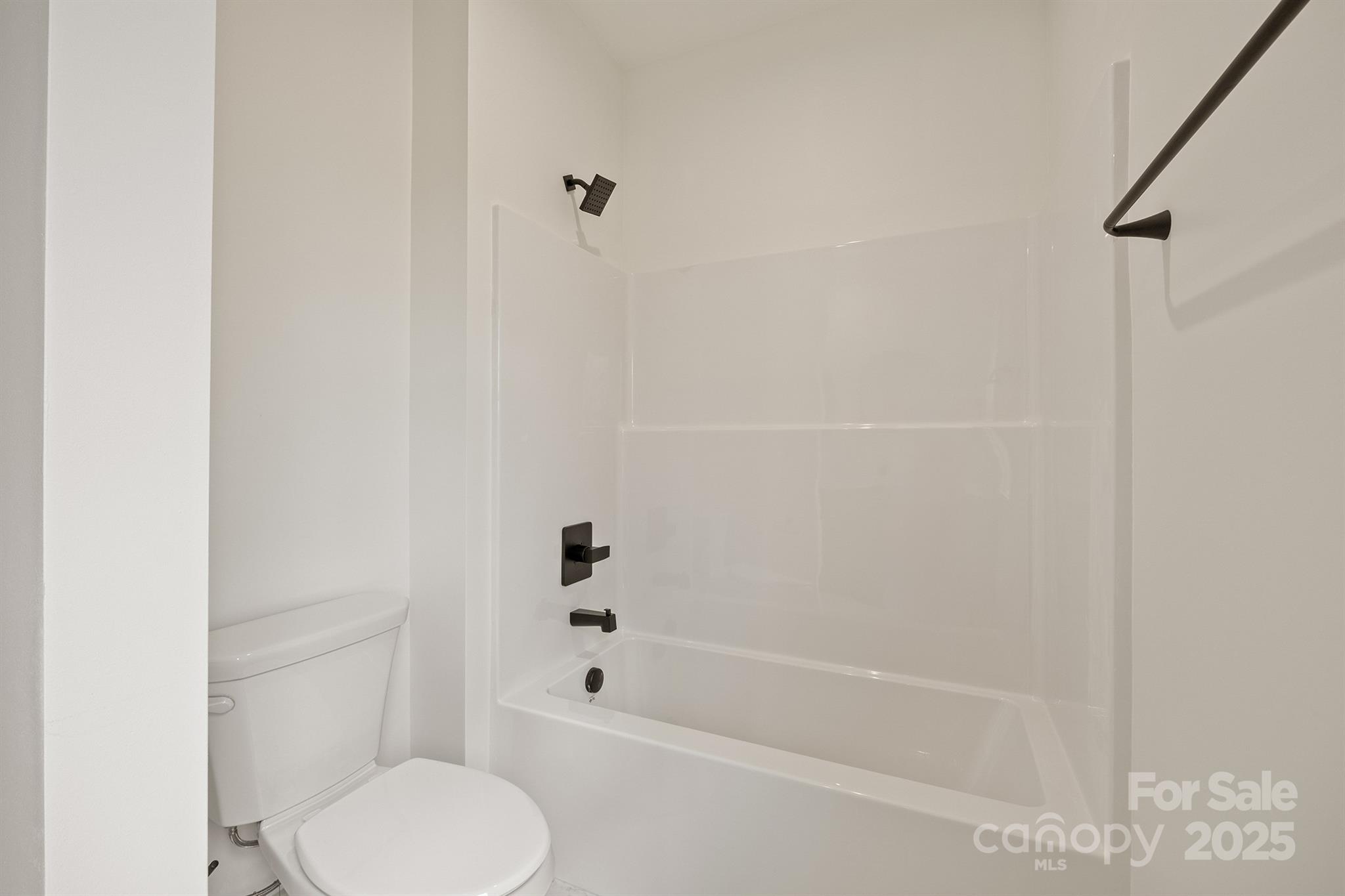 1568 Pleasant Grove Church Road Crouse, NC 28033 - Photo 38 of 48 a bathroom with a shower and a toilet