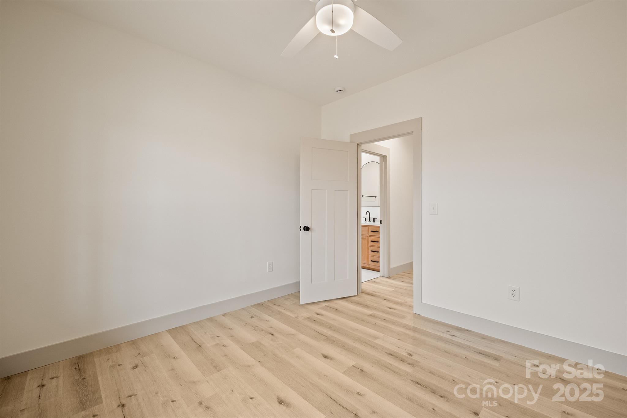 1568 Pleasant Grove Church Road Crouse, NC 28033 - Photo 41 of 48 an empty room with wooden floor and windows