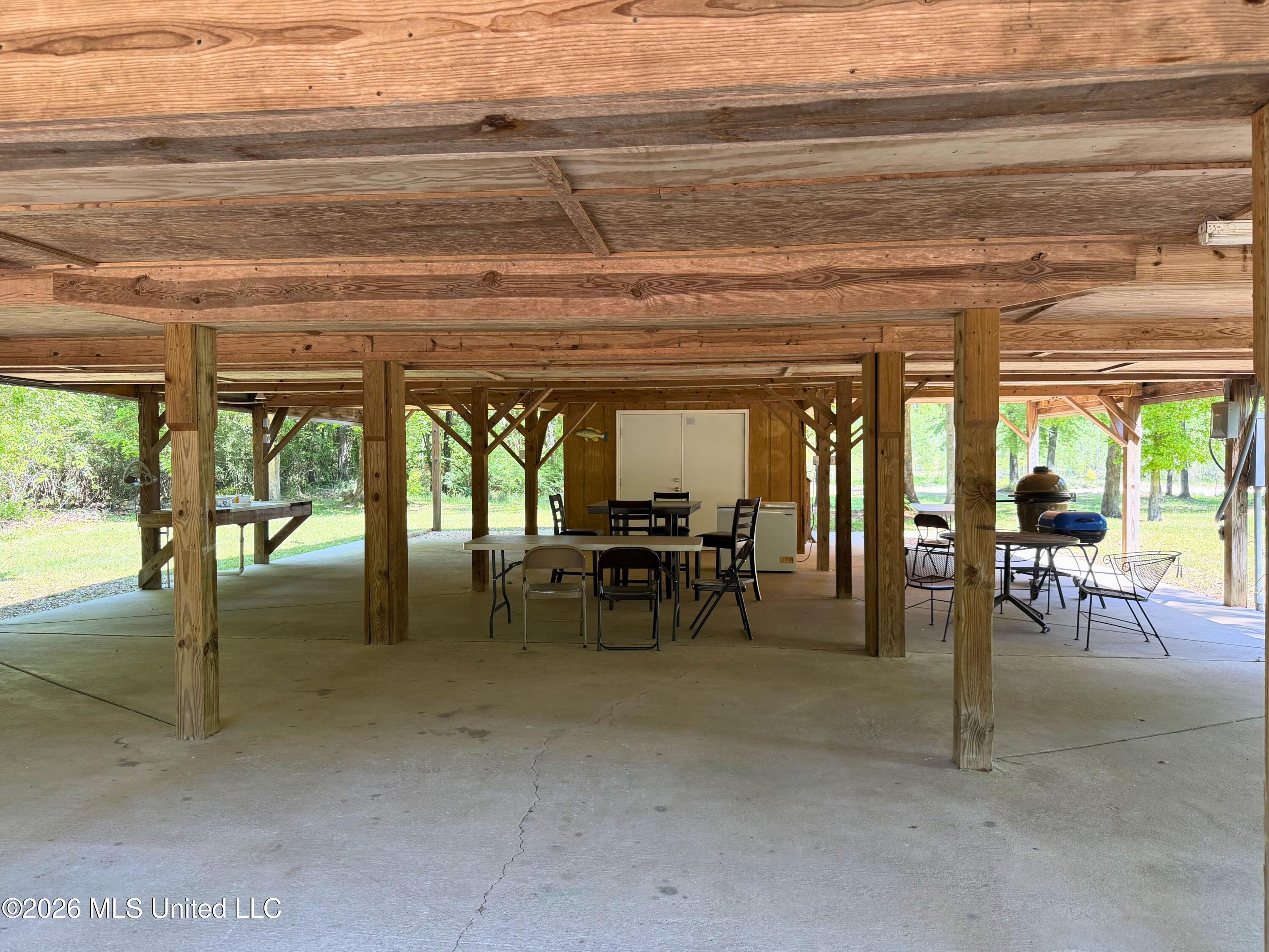 143 Ralph's Drive Leakesville, MS 39451 - Photo 25 of 35 Storage and Outdoor Playspace under the
