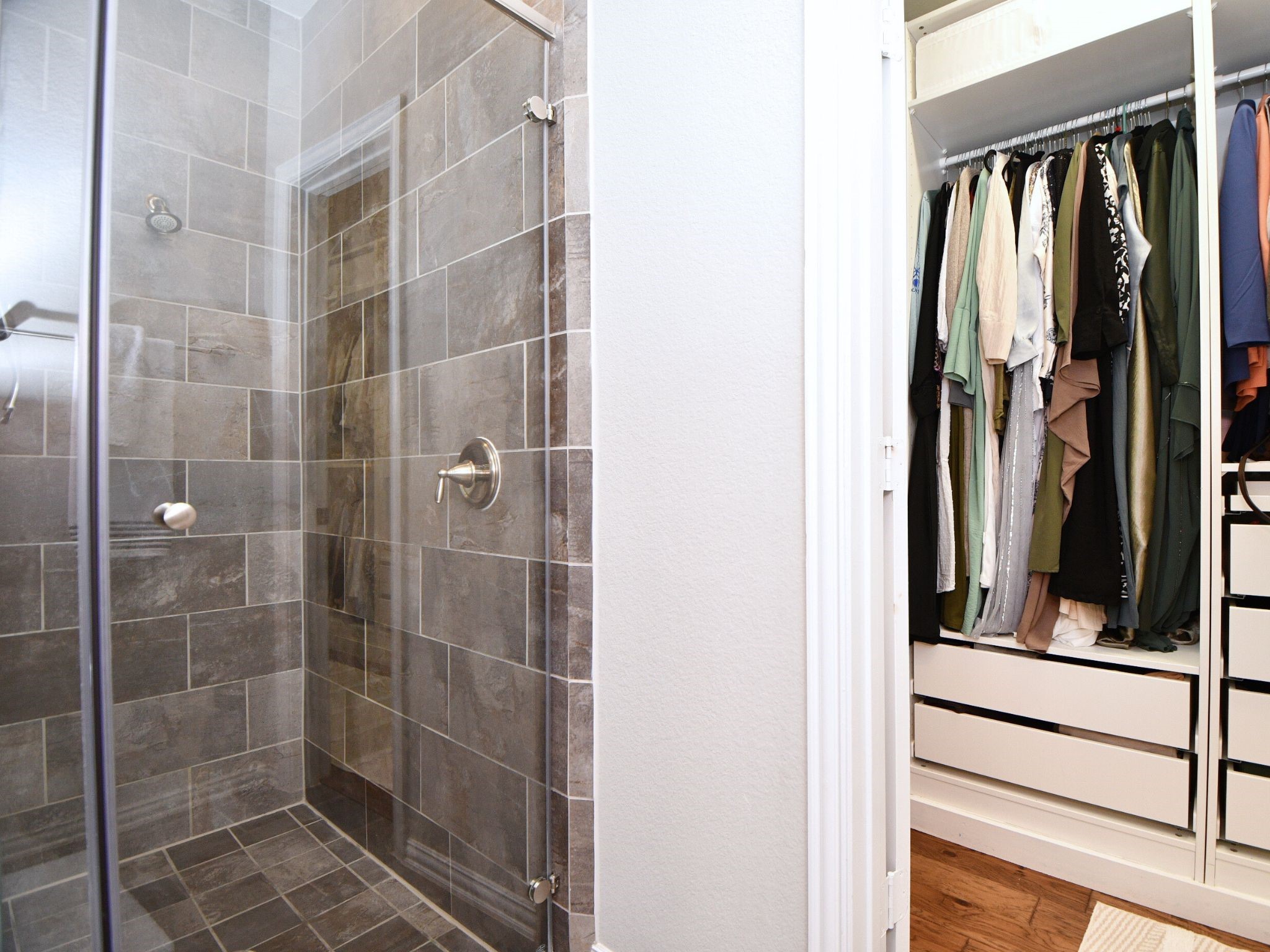 4523 Juniper Ridge Lane Manvel, TX 77578 - Photo 20 of 38 a bathroom with a shower and a sink