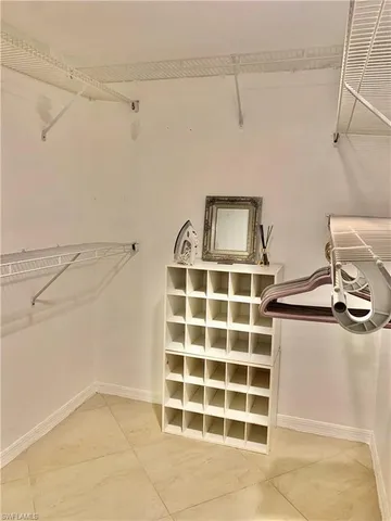 a view of an empty room with a empty shelves