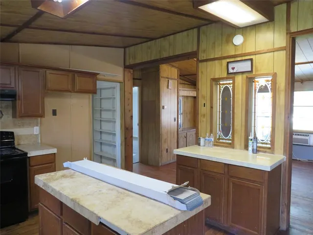 a bathroom with a sink a vanity and a mirror