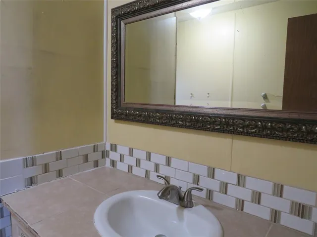 a view of a wooden door and an outdoor space