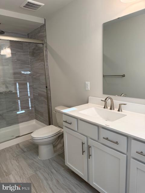 85 Tumblehome Road Inwood, WV 25428 - Photo 21 of 24 Modern bathroom with sleek finishes.