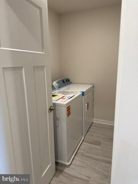 85 Tumblehome Road Inwood, WV 25428 - Photo 22 of 24 Efficient laundry space in a cozy nook.