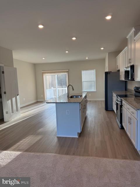 85 Tumblehome Road Inwood, WV 25428 - Photo 9 of 24 Bright and airy modern kitchen space.