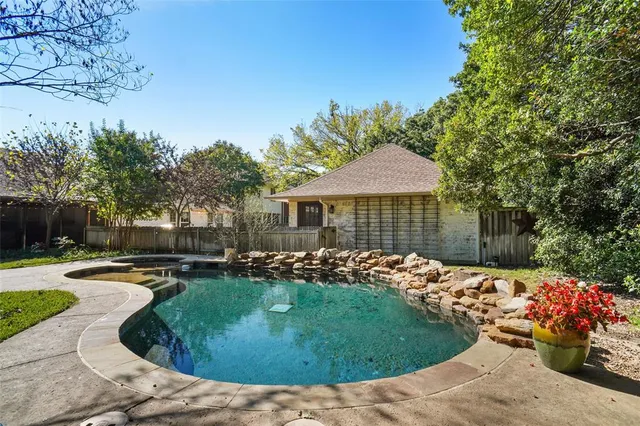 front view of a house with a garden