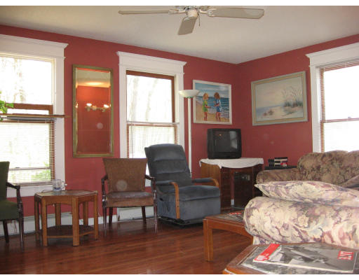 158 Rollins Street Springfield, MA 01109 - Photo 3 of 9 a living room with furniture and a window